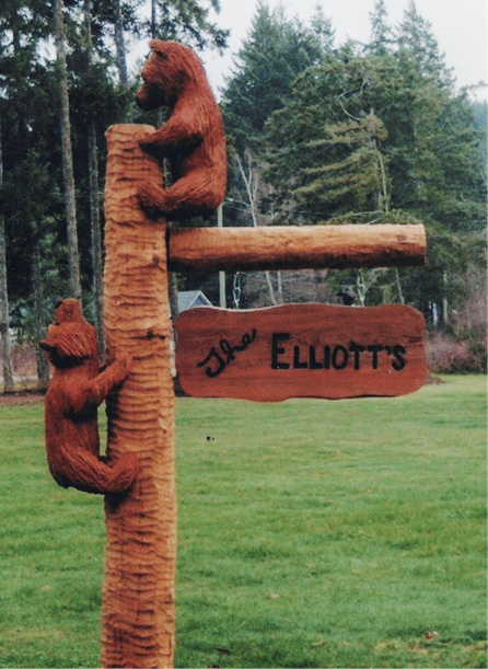 Elliots: Playful, lively cedar sign carving.